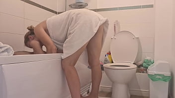 Mom whore sucks her son's cock and fucks him in the bathroom while her husband is gone to the store